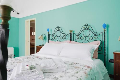 Postel nebo postele na pokoji v ubytování Casa Tiffany