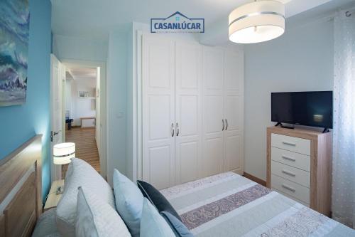 Ένα ή περισσότερα κρεβάτια σε δωμάτιο στο Apartamento Aránzazu playa