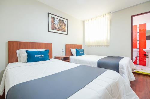 Katil atau katil-katil dalam bilik di Hotel Internacional de Arequipa
