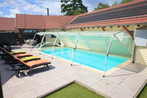 Maison de 2 chambres avec piscine privee sauna et jardin clos a Gertwiller