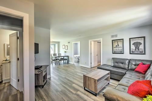a living room with a couch and a table at Twin Lakes Escape with Deck Less Than 1 Mi to Beach! in Twin Lakes