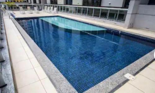 בריכת השחייה שנמצאת ב-S4 HOTEL Águas Claras Flat או באזור