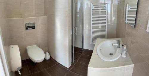 Kúpeľňa v ubytovaní Bogoly Apartman
