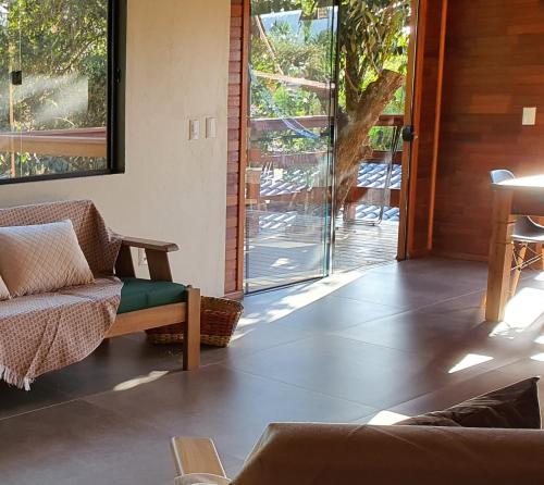 Ruang duduk di Casa perto da praia, canto Norte da Ferrugem
