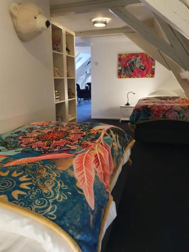 Letto o letti in una camera di Badhotel Bruin
