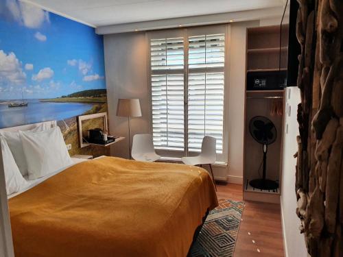 Letto o letti in una camera di Badhotel Bruin