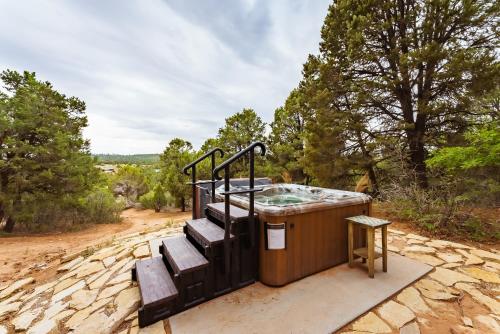 a set of stairs leading up to a bench at Zion Ponderosa Ranch Resort in Springdale