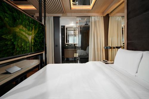 Letto o letti in una camera di Eden Luxury Suites Terazije
