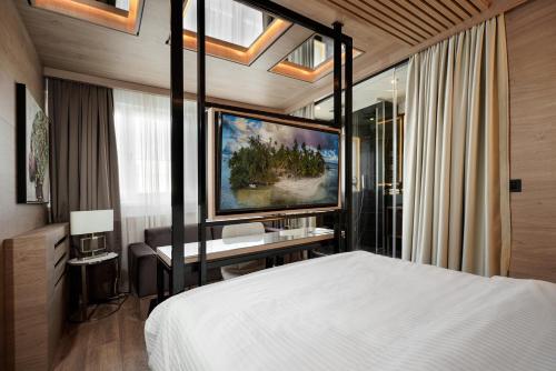Letto o letti in una camera di Eden Luxury Suites Terazije