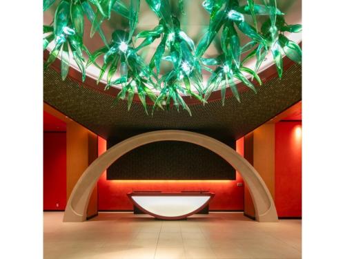 a bathroom with a white tub and an archway at Miyakojima Kurima Resort Seawood Hotel - Vacation STAY 16233v in Uechi