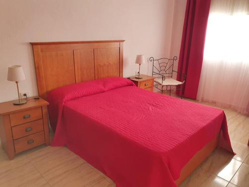 Ένα ή περισσότερα κρεβάτια σε δωμάτιο στο Friendly Palm-Mar