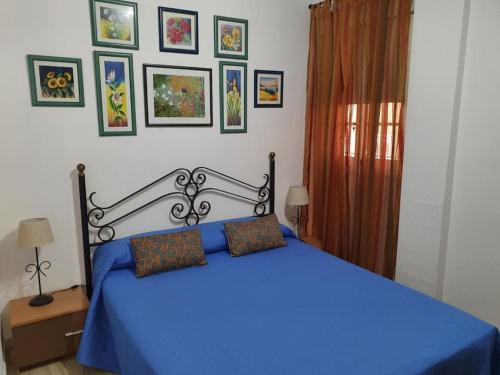 Ένα ή περισσότερα κρεβάτια σε δωμάτιο στο Friendly Palm-Mar