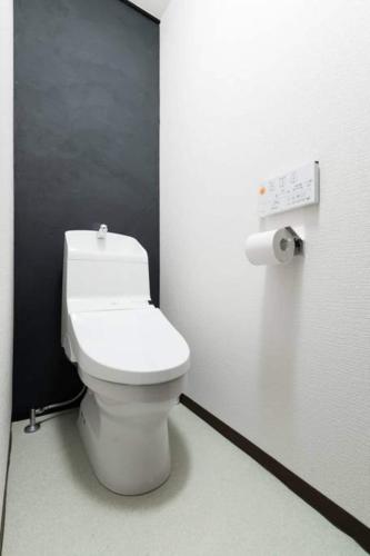 a bathroom with a white toilet in a stall at Oyado NAKAZ1 - Vacation STAY 27690v in Osaka
