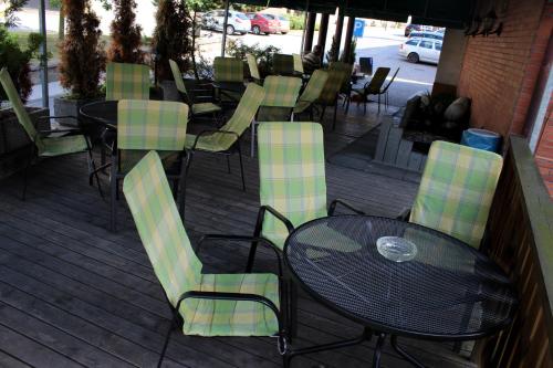 a table and chairs sitting on a patio at Hotel Sonata in Hradec nad Moravici