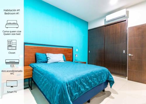 1 dormitorio azul con 1 cama y armario marrón en Departamento con Alberca, Jacuzzi y Vista al Mar en Mazatlán