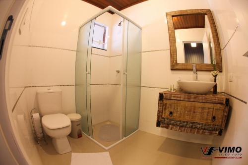 Kylpyhuone majoituspaikassa Eco Hotel Bouganville