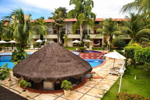 Der Swimmingpool an oder in der Nähe von Apartamento Studio - Solar Pipa