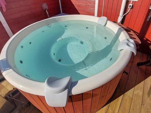 a jacuzzi bathtub in a house with at 6 person holiday home in Hemmet in Hemmet