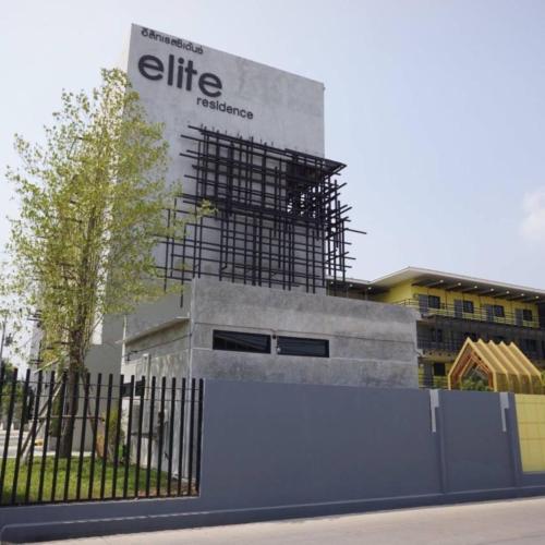a building under construction with a sign on it at Elite Residence Phitsanulok SHA in Phitsanulok