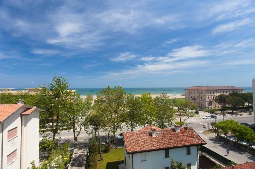 a view of the beach from a building at Hotel Dolcevita in Cesenatico