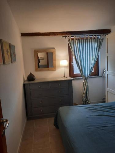 En eller flere senge i et værelse på Casa Bella Vista Trevignano Romano