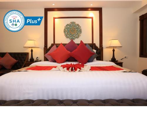 سرير أو أسرّة في غرفة في Viangluang Resort