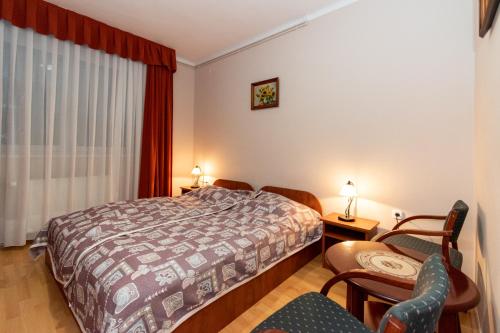 Postel nebo postele na pokoji v ubytování Canary Color Guesthouse