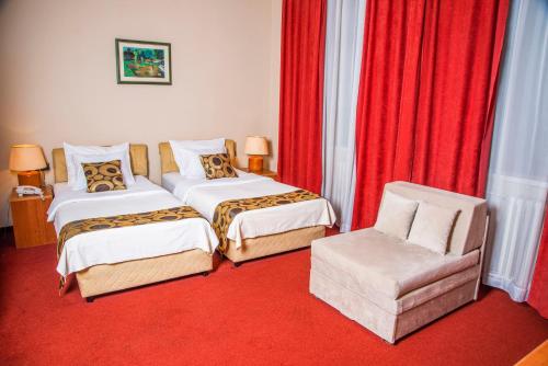 Postel nebo postele na pokoji v ubytování Hotel N