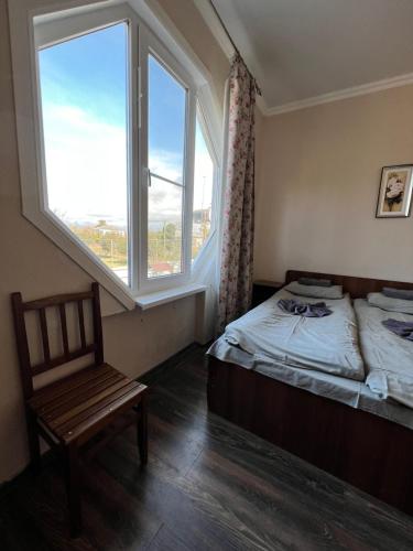 Ένα ή περισσότερα κρεβάτια σε δωμάτιο στο Guest House Evkalipt