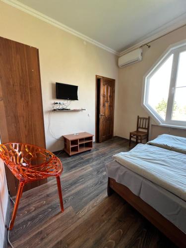Ένα ή περισσότερα κρεβάτια σε δωμάτιο στο Guest House Evkalipt