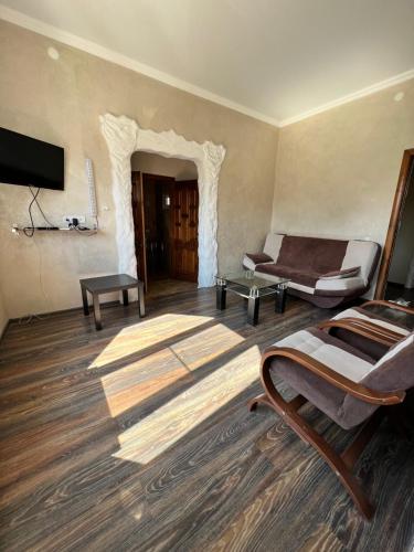 Μια τηλεόραση ή/και κέντρο ψυχαγωγίας στο Guest House Evkalipt