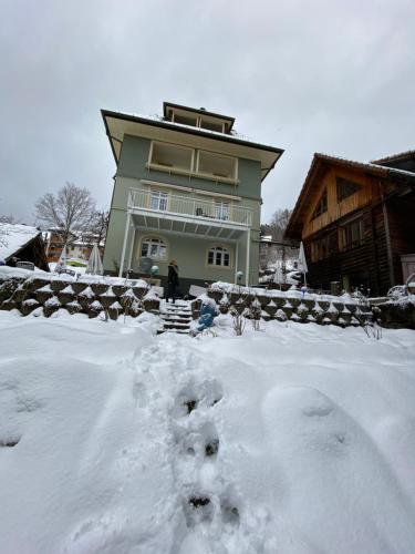 a house with a footprint in the snow at Haus Silberdistel in Todtmoos