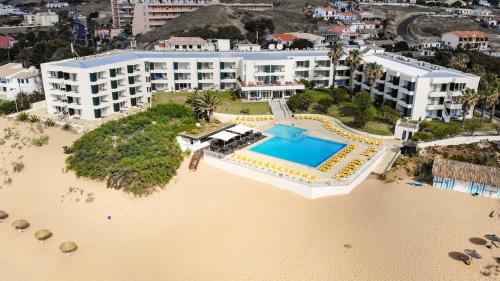 an aerial view of a resort on the beach at Vila Baleira Suites in Porto Santo