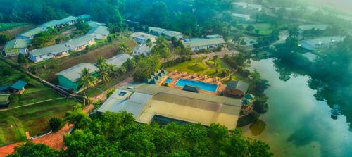 an aerial view of a house next to a river at Laya Leisure Resort & Spa in Kalawana