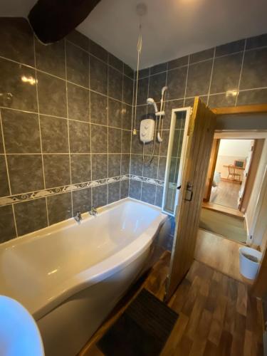 Koupelna v ubytování Cosy country cottage