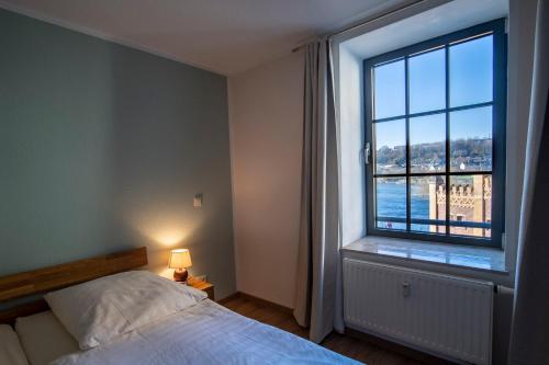 Postel nebo postele na pokoji v ubytování Hotel Birschel-Mühle