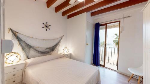 Voodi või voodid majutusasutuse Apartamento en primera linea de playa de Villajoyosa toas