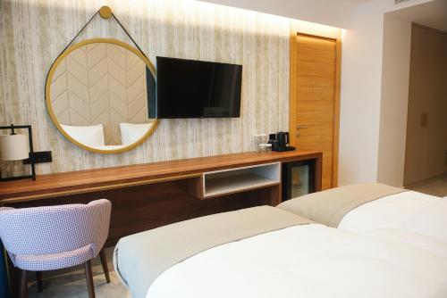 Postel nebo postele na pokoji v ubytování Hotel Zlatibor