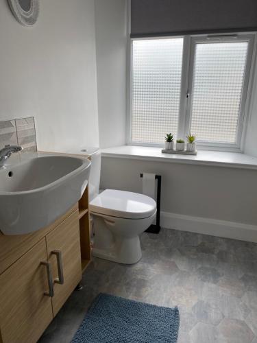 Ванная комната в Dympna's City Centre apartment, Armagh