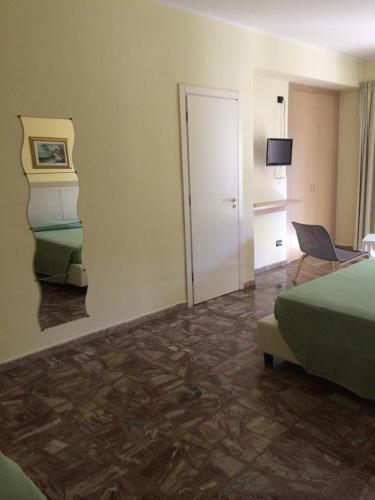 Postel nebo postele na pokoji v ubytování Albergo Carpino