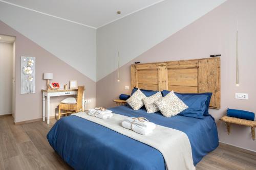 A bed or beds in a room at A Casa di Ale