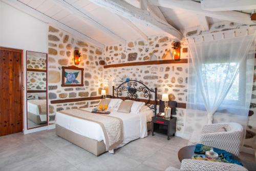 Postel nebo postele na pokoji v ubytování Acrotel Athena Residence