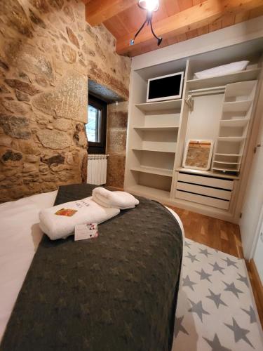 A bed or beds in a room at Casa Maral