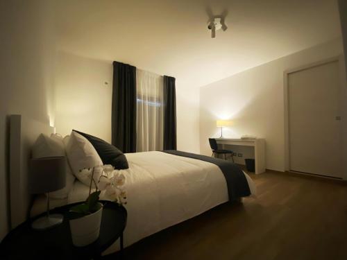 A bed or beds in a room at Casa Giulia