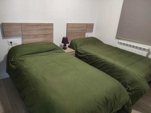 Posteľ alebo postele v izbe v ubytovaní La Portela Riverside