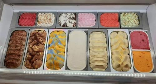 a drawer full of different types of food at Jolán Pension & Restaurant in Číčov