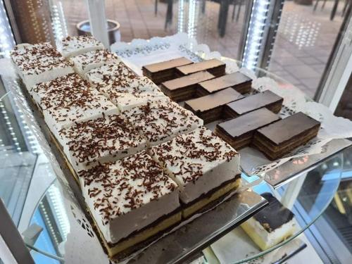 a display of chocolate desserts on a table at Jolán Pension & Restaurant in Číčov