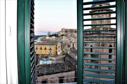 a view of a city from a window at B&B Belvedere All'Idria in Ragusa