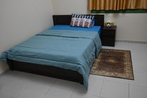 Cama ou camas em um quarto em Entire Studio Flat in Sharjah.
