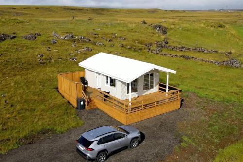 A bird's-eye view of EYVÍK Cottages - Private HOT TUB!